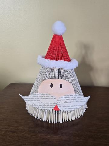 Picture of a Santa made out of a book